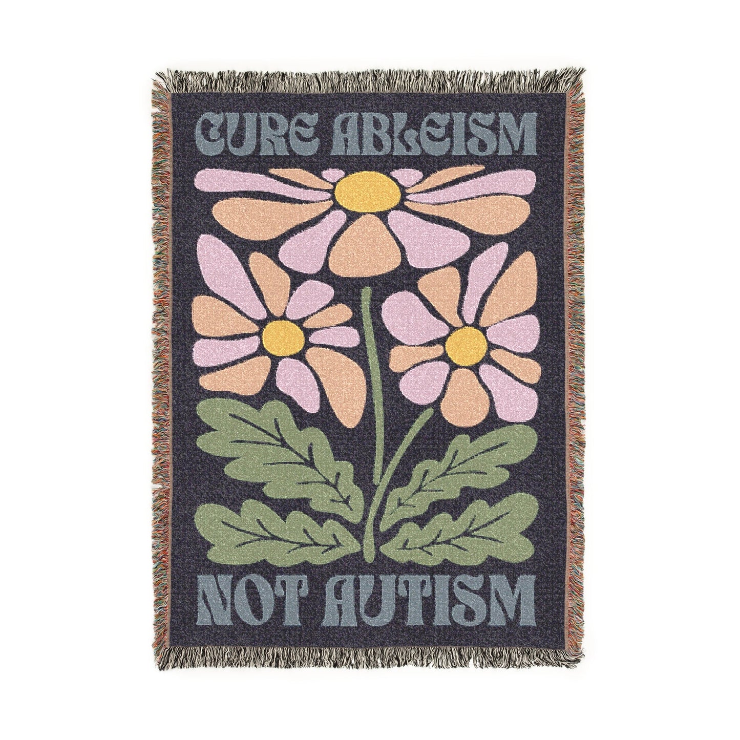 Blanket with floral design and text 'Cure Ableism Not Autism' on a white background